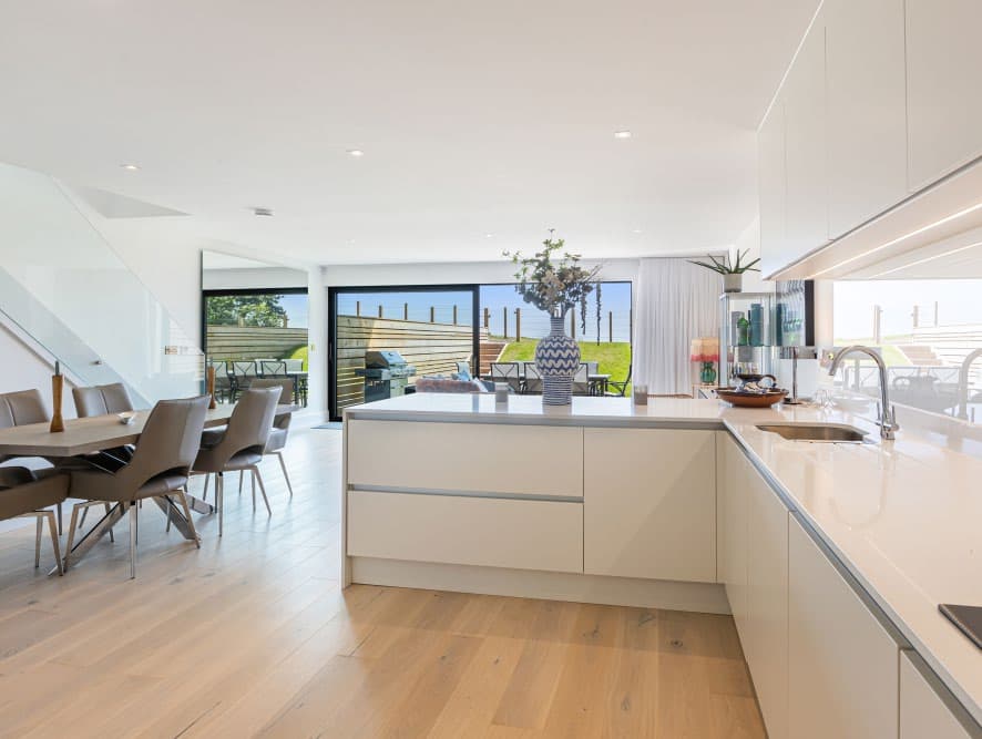 Open plan kitchen and dining room in a completed Shell Cove home